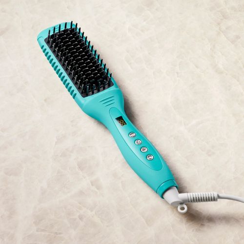 Cette brosse chauffante en céramique de Moroccanoil est un mélange entre un fer à plat et une brosse en céramique pour faire une magnifique finition dans vos cheveux.