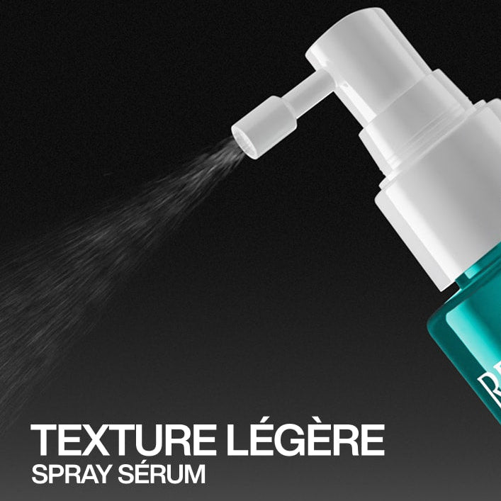 Spray sérum densifiant Redken Acidic Grow Full en flacon turquoise avec vaporisateur blanc diffusant une brume légère, texture fine sur fond noir professionnel.