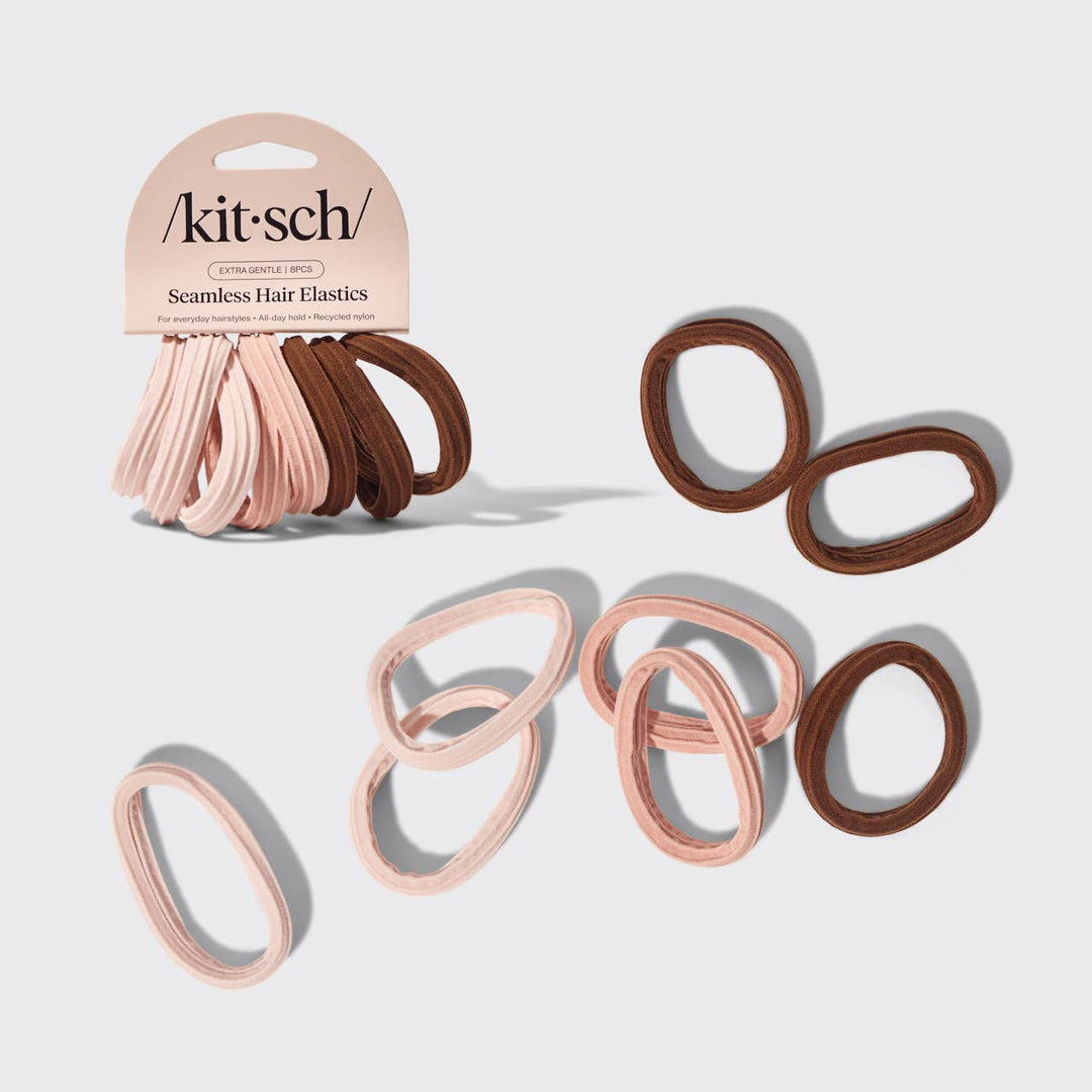 Élastiques KITSCH sans couture recyclés couleur bois de rose et rose nude disposés sur fond gris clair, accessoires cheveux écologiques pour coiffures élégantes.