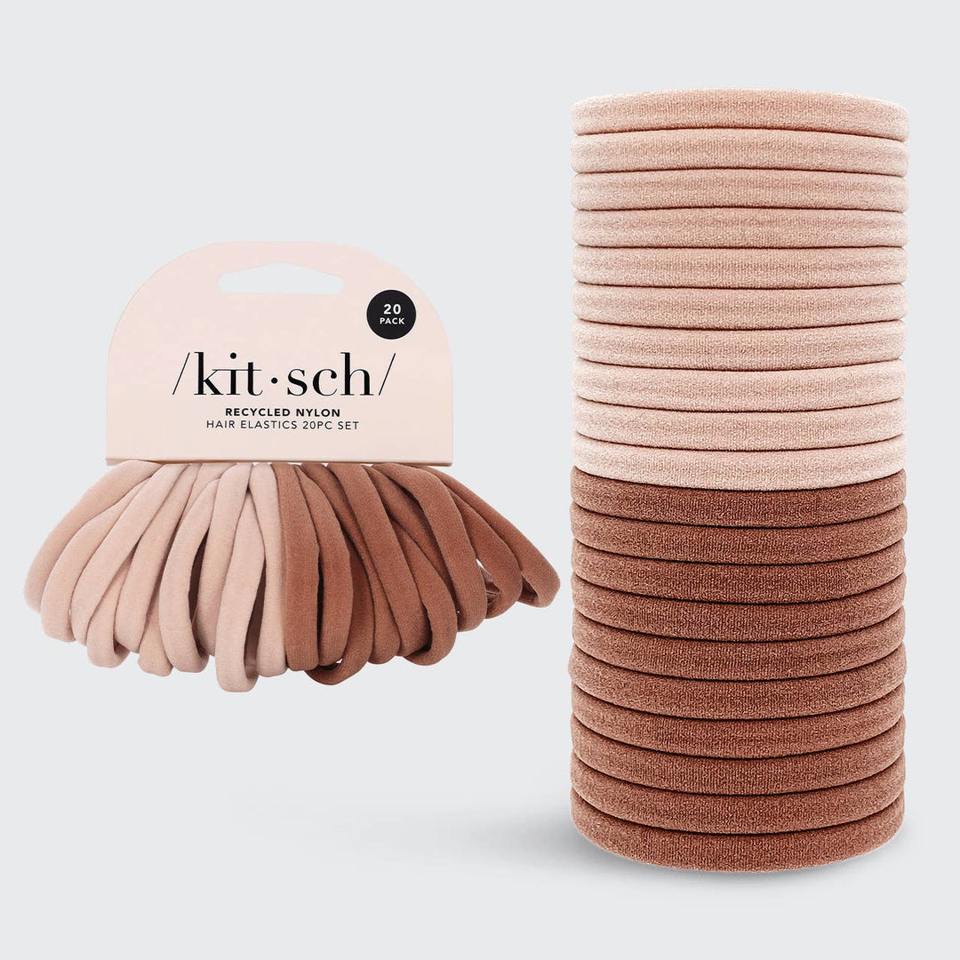 Lot de 20 élastiques KITSCH rose poudré en nylon recyclé, présentés sur emballage beige minimaliste avec assortiment de teintes nude et vieux rose sur fond gris clair.