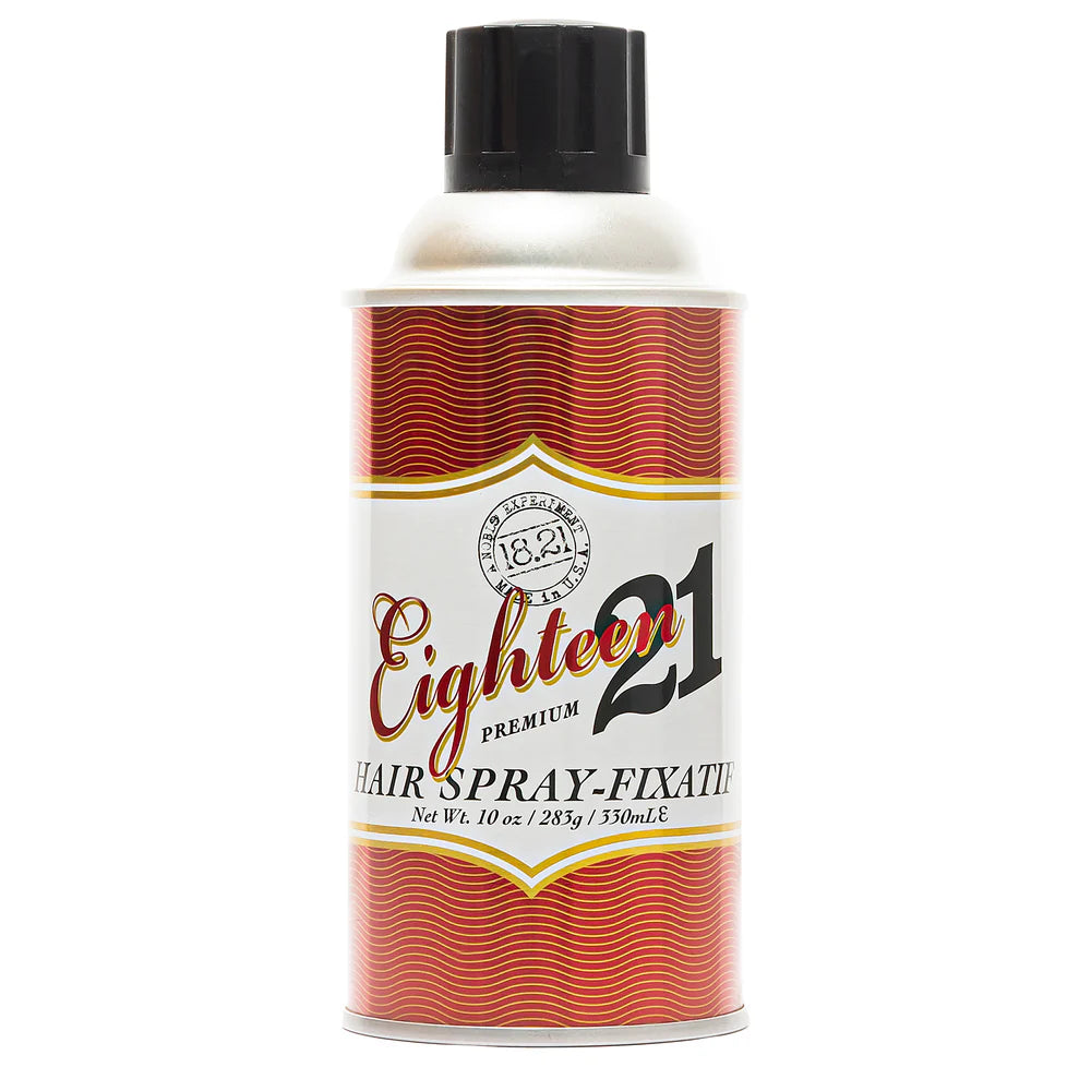 Spray coiffant 18.21 Man Made Hair Spray, format 350 mL, au design vintage rouge et blanc avec capuchon noir, posé sur fond blanc professionnel. Produit coiffant pour homme au fini mat et parfum signature Sweet Tobacco.