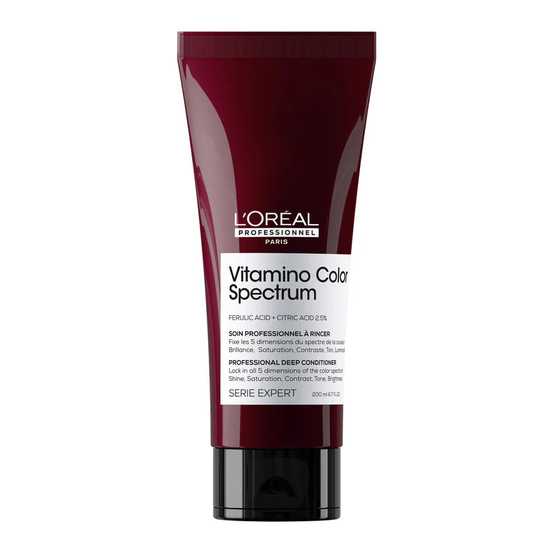 Tube de soin capillaire L’Oréal Professionnel Vitamino Color Spectrum rouge bordeaux avec bouchon noir, format 200 ml, posé sur fond blanc minimaliste, revitalisant professionnel pour cheveux colorés conçu pour protéger l’éclat et prolonger la couleur