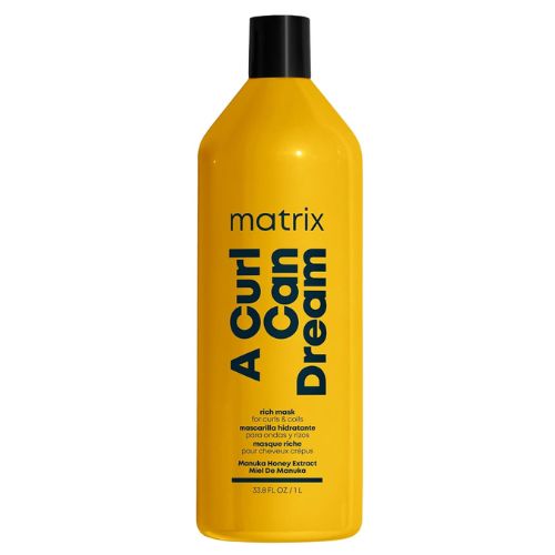 Pot jaune de 1 litre du masque riche Matrix A Curl Can Dream, conçu pour hydrater intensément les cheveux frisés, crépus et très secs. Formule nourrissante au miel de Manuka, idéale pour les chevelures épaisses.
