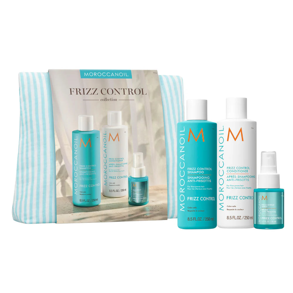 Coffret Frizz Control Moroccanoil avec shampoing anti-frisottis, revitalisant et soin sans rinçage présenté avec une trousse turquoise.