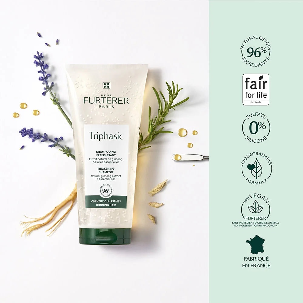 Tube shampoing Triphasic René Furterer entouré de lavande, romarin et racine de ginseng, avec icônes formule naturelle 96%, sans silicone, vegan, fond vert et blanc