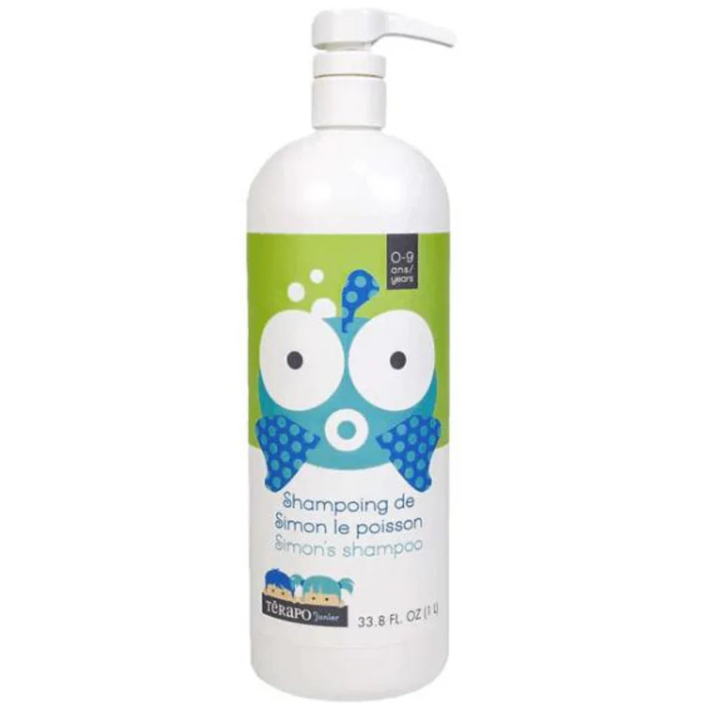 Bouteille de shampoing pour enfant Térapo Junior, décorée d’un poisson bleu aux grands yeux sur fond vert, adaptée aux enfants de 0 à 9 ans.