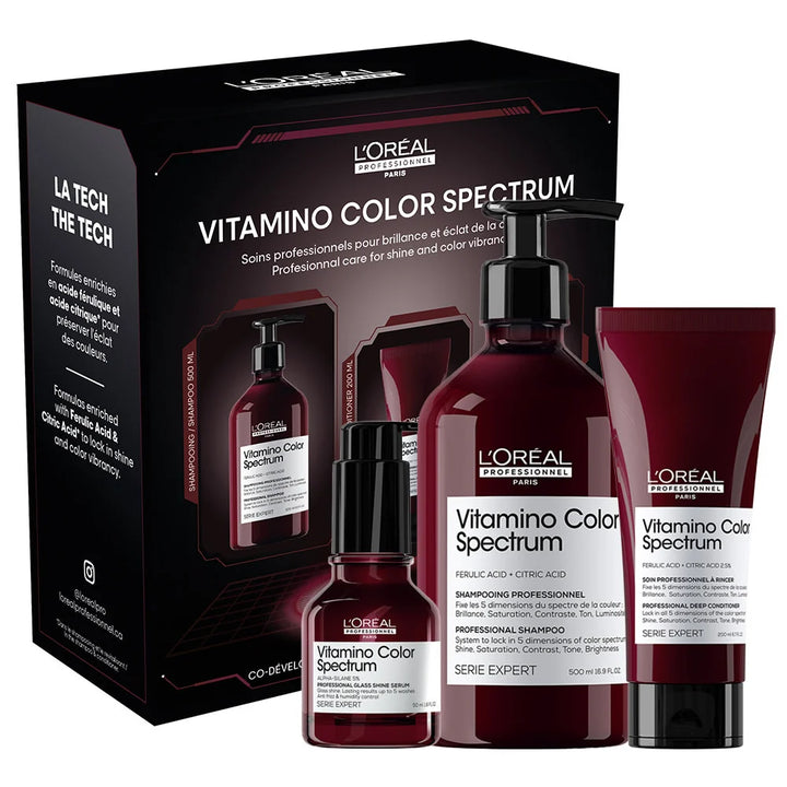 Coffret Vitamino Color Spectrum de L’Oréal Professionnel contenant le shampoing 500 ml, le soin à rincer 200 ml et le sérum 50 ml. Boîte noire avec visuels des produits, posée sur fond blanc. Soins professionnels pour brillance et éclat de la couleur.