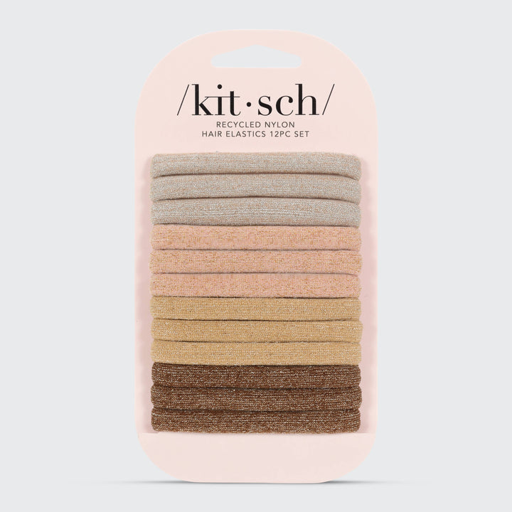 Ensemble de 12 élastiques KITSCH en nylon recyclé à paillettes tons neutres sur emballage beige rosé, accessoires cheveux sans couture avec finition scintillante.