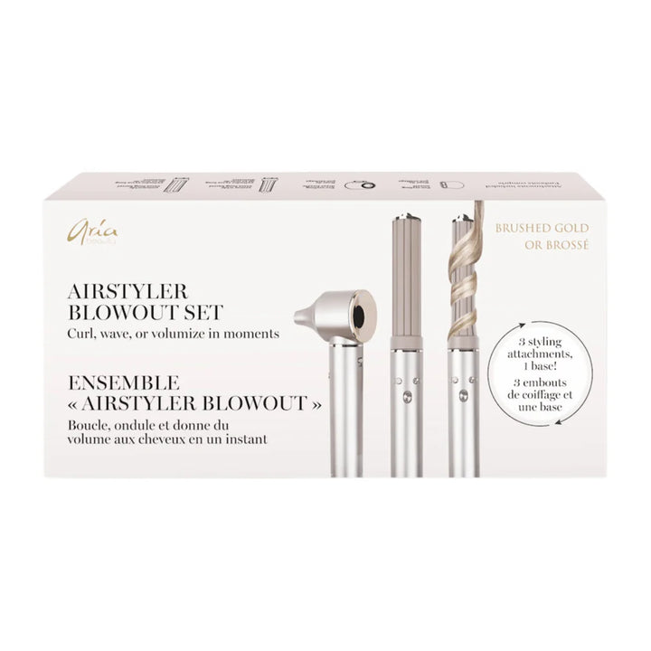 Boîte ARIA Ensemble Airstyler Blowout couleur or brossé présentant un outil coiffant multifonction avec embouts interchangeables pour boucler, onduler et volumiser les cheveux.