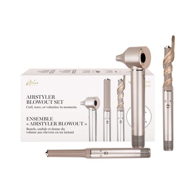 Outil coiffant multifonction ARIA Airstyler Blowout avec accessoires interchangeables et emballage or brossé, conçu pour sécher, boucler et volumiser les cheveux rapidement.