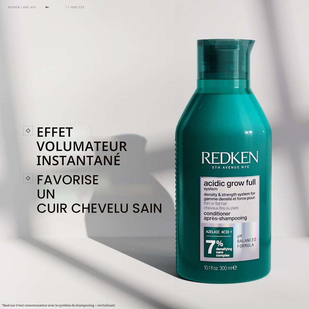 Après-shampoing Redken Acidic Grow Full 300 ml en flacon turquoise brillant sur fond blanc avec ombre douce, conçu pour apporter volume et densité aux cheveux fins.