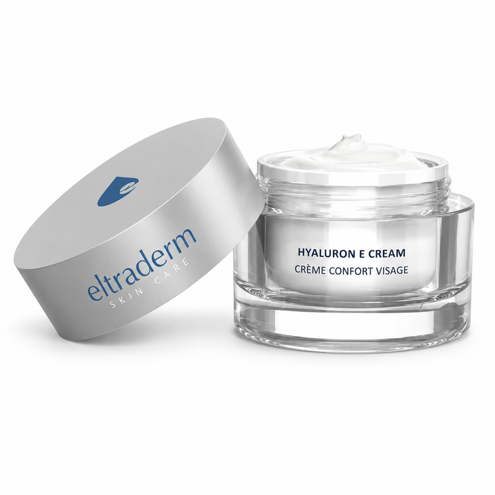Crème hydratante Hyaluron E Eltraderm Skin Care 50 ml dans un pot en verre transparent avec couvercle argent mat et emballage blanc aux accents bleus, présentée sur fond blanc professionnel.