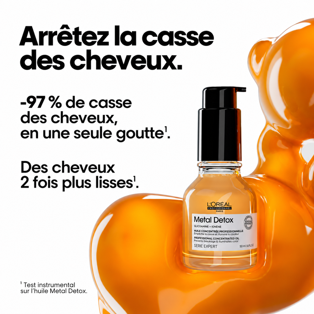 Huile Metal Detox L’Oréal Professionnel 50 ml sur texture huileuse orangée, soin concentré aidant à réduire la casse et lisser les cheveux.