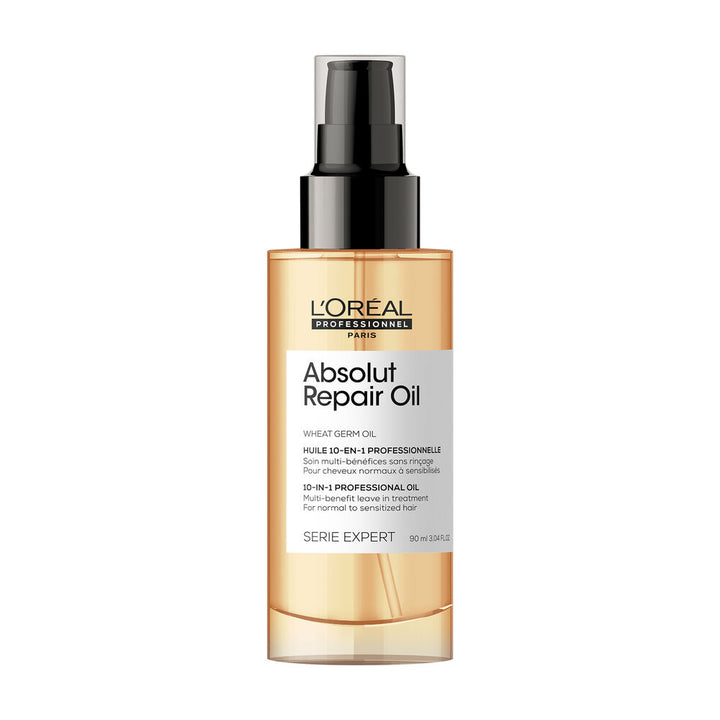Huile capillaire L'Oréal Professionnel Absolut Repair Oil 10-en-1, flacon transparent doré de 90 ml avec pompe noire, sur fond blanc.