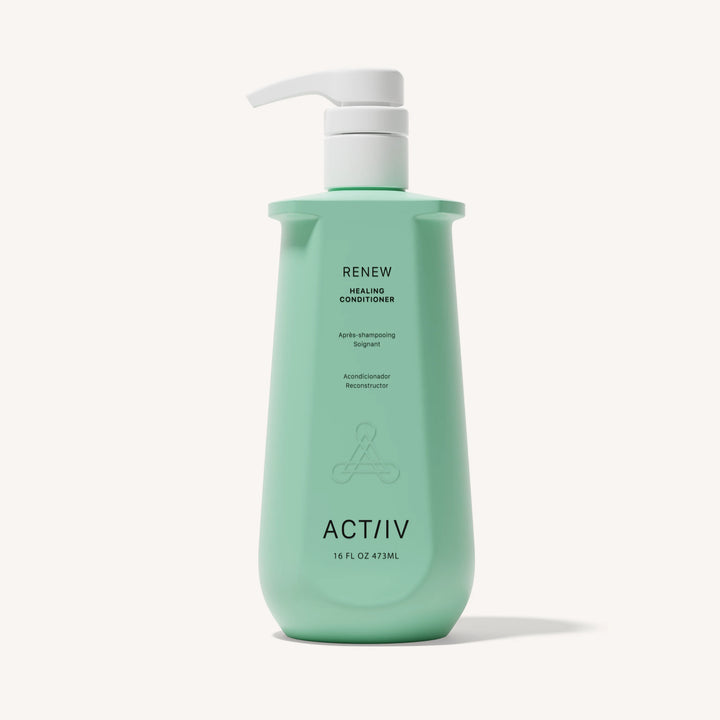 Après-shampoing ACT/IV Renew Healing Conditioner en flacon vert pastel avec pompe blanche, format 473 ml, présenté sur fond blanc minimaliste, soin capillaire réparateur et hydratant.