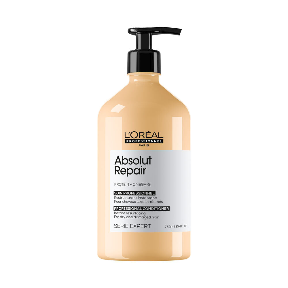 Soin revitalisant professionnel L’ORÉAL Absolut Repair 750 ml pour cheveux secs et abîmés, flacon beige doré avec pompe noire et étiquette blanche.