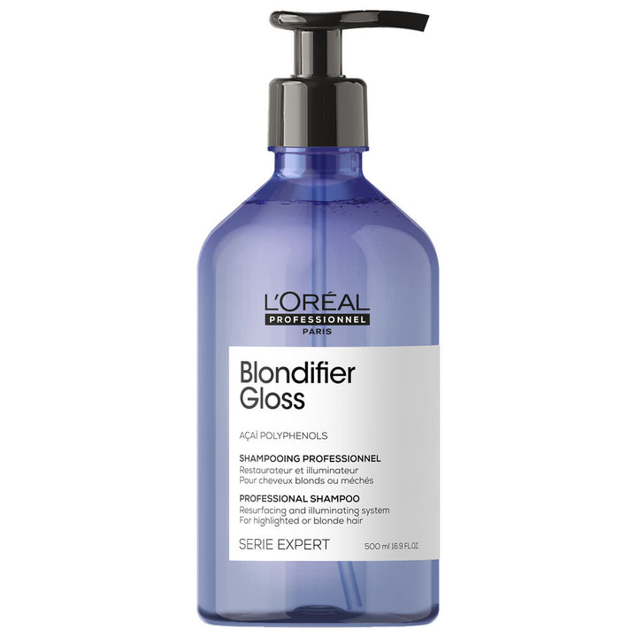 Shampoing Blondifier Gloss L’Oréal Professionnel 500 ml, bouteille bleu lavande avec pompe noire, soin illuminateur aux polyphénols d’açaï pour cheveux blonds.