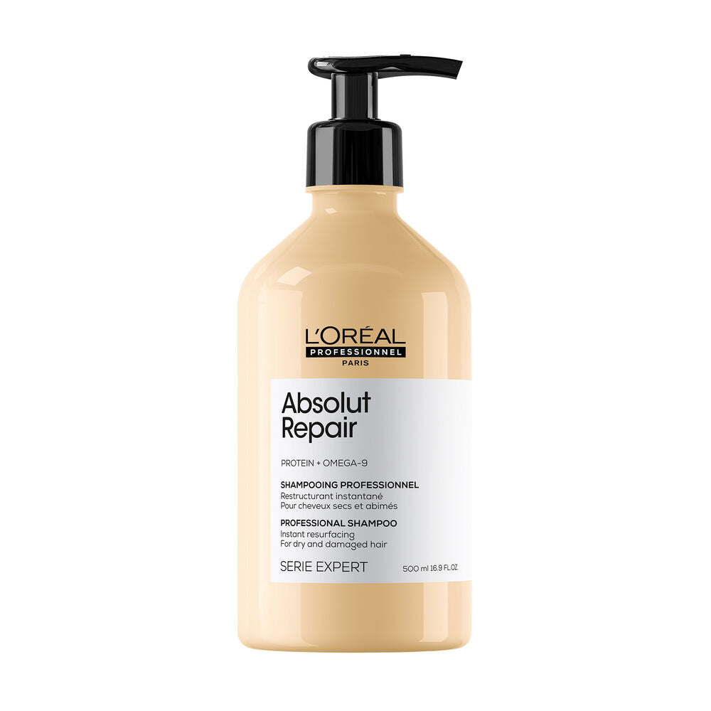 Shampoing L’ORÉAL Professionnel Absolut Repair 500 ml pour cheveux secs et abîmés, bouteille beige doré avec pompe noire sur fond blanc.