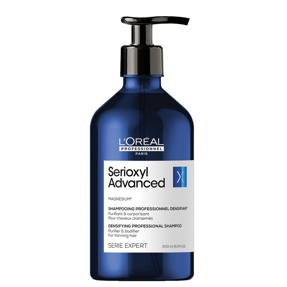 Shampoing densifiant L’Oréal Professionnel Serioxyl Advanced 500 ml au magnésium pour cheveux clairsemés, bouteille bleue avec pompe noire.