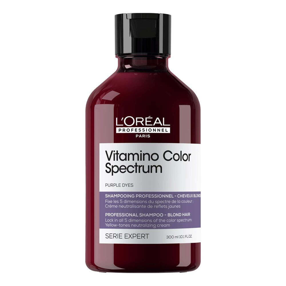 Shampoing neutralisant violet L’Oréal Professionnel Vitamino Color Spectrum 300 ml pour cheveux blonds, bouteille bordeaux avec bouchon noir et étiquette violette.