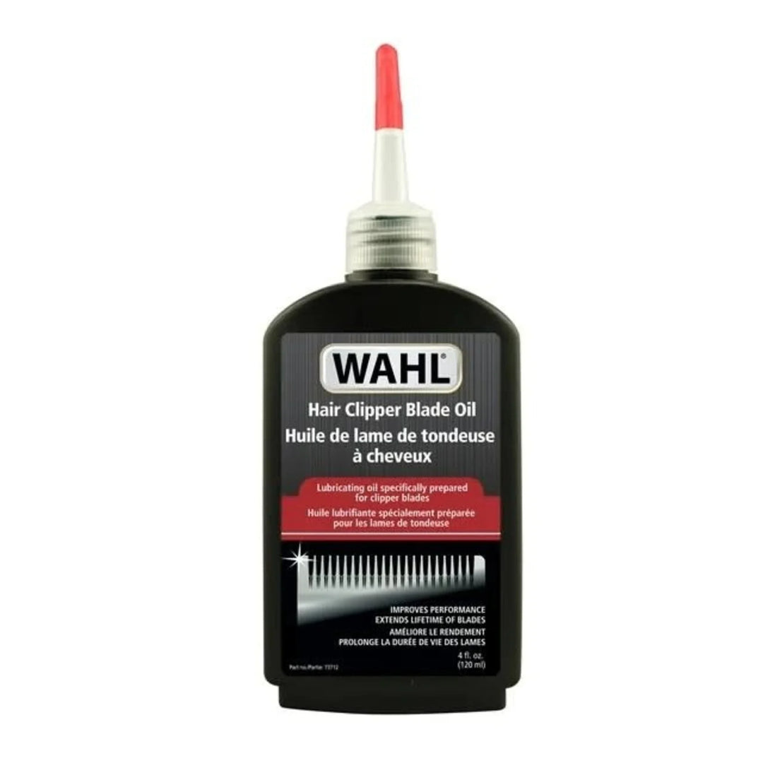 Bouteille noire d’huile pour tondeuse WAHL 120 ml avec embout applicateur rouge, huile lubrifiante professionnelle pour l’entretien, la protection et la performance des lames de tondeuse, sur fond gris clair.